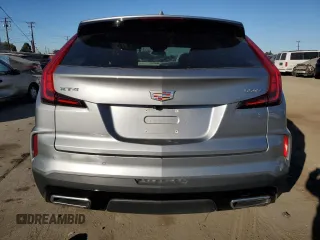 2024 Cadillac XT4 FWD Premium Luxury z VIN 1GYFZCR47RF126643, wystawiony jako Copart lot #50268745 z przebiegiem 24 583 mil mil oraz Czysty tytuł • Clean title. Historia ofert i sprzedaży dostępna na DreamBid. Obrazek 6.