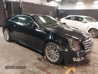 2012 Cadillac CTS z VIN 1G6DA1E35C0139474, wystawiony jako IAAI lot #42236995 z przebiegiem 143 262 mil mil oraz . Historia ofert i sprzedaży dostępna na DreamBid. Obrazek 1.