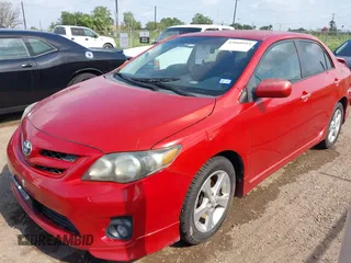 2013 Toyota Corolla L with VIN 5YFBU4EE4DP207480, listed as a IAAI auction lot 42060919 with 129,193 mi miles. Bid and sale history available at carsss.com. Image 2.