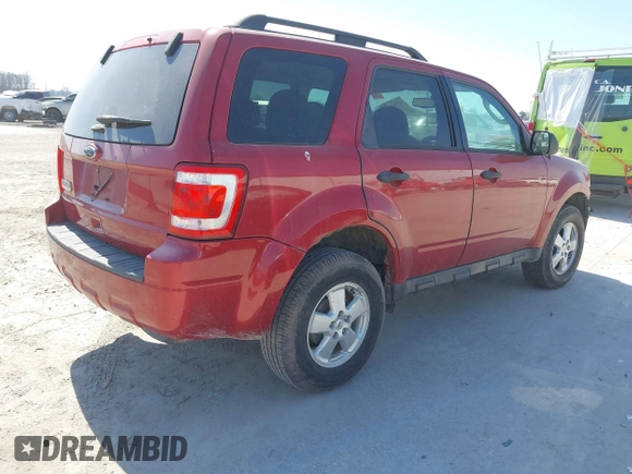 2011 Ford Escape XLT with VIN 1FMCU0D70BKC18662, listed as a IAAI auction lot 41769355 with 173,040 mi miles. Bid and sale history available at carsss.com. Image 4.