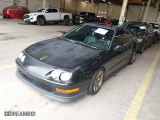 1999 Acura Integra GS-R with VIN JH4DC2397XS001674, listed as a IAAI auction lot 41857042 with 205,494 mi miles. Bid and sale history available at carsss.com. Image 2.