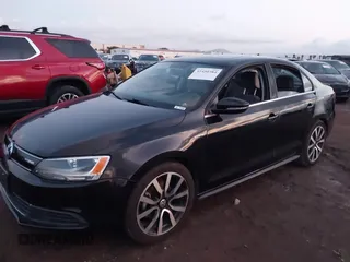 2013 Volkswagen Jetta Hybrid SEL with VIN 3VW637AJ1DM277984, listed as a IAAI auction lot 41450384 with 117,665 mi miles and . Bid and sale history available at DreamBid. Image 6.