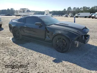 2012 Ford Mustang GT Premium with VIN 1ZVBP8CF7C5271581, listed as a Copart auction lot 46416255 with 167,239 mi miles and Salvage Title. Bid and sale history available at DreamBid. Image 4.