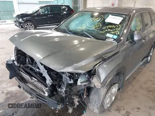 2019 Hyundai Santa Fe SE with VIN 5NMS2CAD7KH094144, listed as a IAAI auction lot 41984633 with 46,307 mi miles and . Bid and sale history available at DreamBid. Image 12.