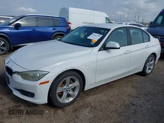 2015 BMW 3 Series 320i with VIN WBA3B1G5XFNT05903, listed as a IAAI auction lot 42063574 with Not Provided miles. Bid and sale history available at carsss.com. Image 2.