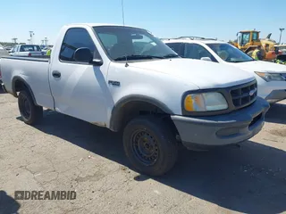 1997 Ford F-150 with VIN 1FTDF18W1VKC71272, listed as a IAAI auction lot 42736151 with 160,730 mi miles and . Bid and sale history available at DreamBid. Image 1.