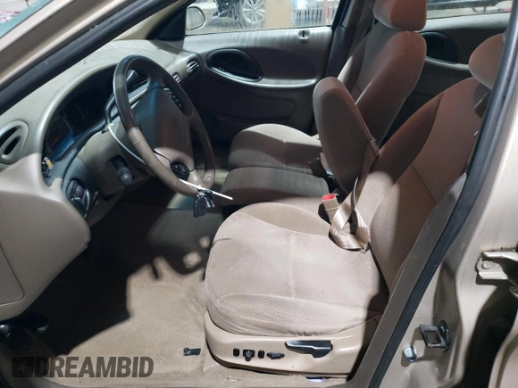 1999 Ford Taurus SE with VIN 1FAFP53S6XA242981, listed as a Copart auction lot 43211425 with 111,966 mi miles and Salvage title. Bid and sale history available at DreamBid. Image 7.
