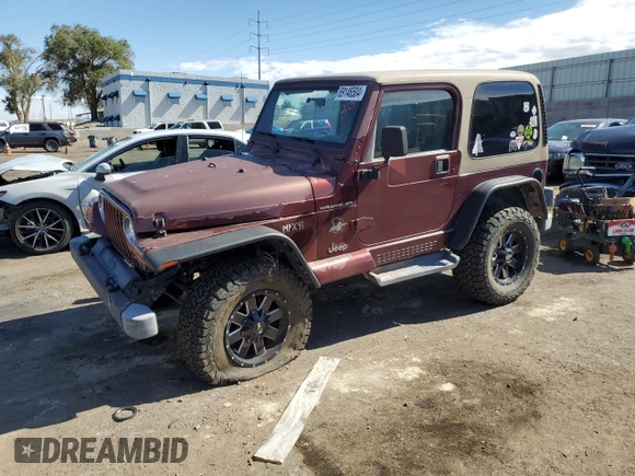 2002 Jeep Wrangler Sahara with VIN 1J4FA59S12P704608, listed as a Copart auction lot 69146504 with 125,920 mi miles and Salvage Title. Bid and sale history available at carsss.com. Image 1.