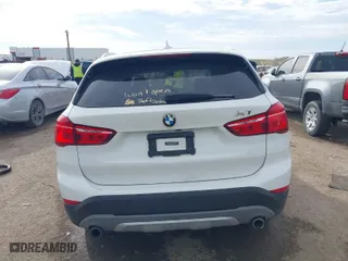 2018 BMW X1 xDrive28i with VIN WBXHT3C35J5K24695, listed as a IAAI auction lot 40932205 with 66,354 mi miles. Bid and sale history available at carsss.com. Image 15.