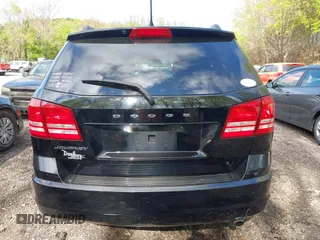 2017 Dodge Journey SE z VIN 3C4PDCAB6HT697631, wystawiony jako IAAI lot #42200146 z przebiegiem 158 511 mil mil oraz . Historia ofert i sprzedaży dostępna na DreamBid. Obrazek 16.