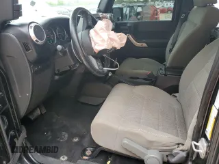 2014 Jeep Wrangler Unlimited Rubicon X with VIN 1C4HJWFG0EL142071, listed as a Copart auction lot 56187575 with 110,597 mi miles and Salvage title. Bid and sale history available at DreamBid. Image 7.