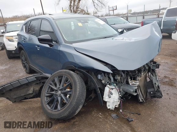 2023 Mazda CX-5 S Carbon Edition z VIN JM3KFBCM9P0109219, wystawiony jako IAAI lot #41183435 z przebiegiem Nie podano mil oraz . Historia ofert i sprzedaży dostępna na DreamBid. Obrazek 1.