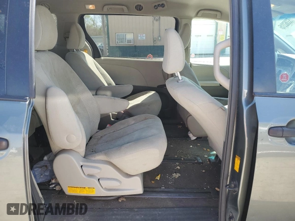 2014 Toyota Sienna L z VIN 5TDZK3DC2ES418247, wystawiony jako Copart lot #53362315 z przebiegiem 165 120 mil mil oraz Szkoda całkowita • Salvage title. Historia ofert i sprzedaży dostępna na DreamBid. Obrazek 11.