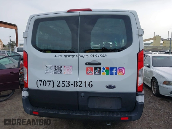 2021 Ford Transit Cargo with VIN 1FTBR1Y81MKA25014, listed as a IAAI auction lot 41594717 with 49,983 mi miles and . Bid and sale history available at DreamBid. Image 16.