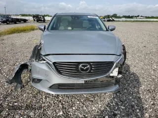 2016 Mazda 6 i Grand Touring с VIN JM1GJ1W53G1434499, выставлен на аукционе Copart как лот 54739745 с пробегом Не указан миль и Списание • Salvage title. История ставок и продаж доступна на DreamBid. Изображение 5.