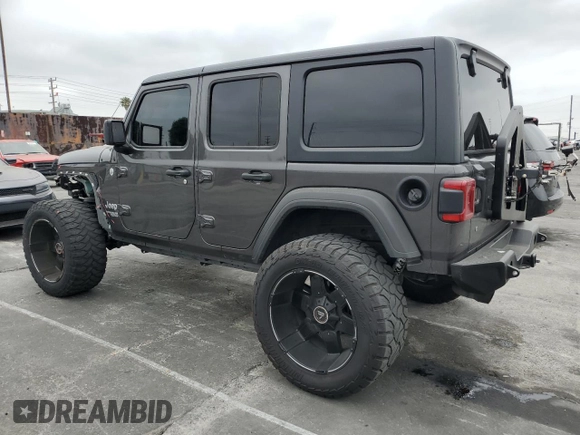 2019 Jeep Wrangler Unlimited Sport S with VIN 1C4HJXDG5KW535115, listed as a Copart auction lot 58404545 with 95,491 mi miles and Salvage title. Bid and sale history available at DreamBid. Image 2.