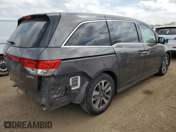 2015 Honda Odyssey Touring Elite z VIN 5FNRL5H96FB047204, wystawiony jako Copart lot #56297985 z przebiegiem 125 482 mil mil oraz Szkoda całkowita • Salvage title. Historia ofert i sprzedaży dostępna na DreamBid. Obrazek 3.
