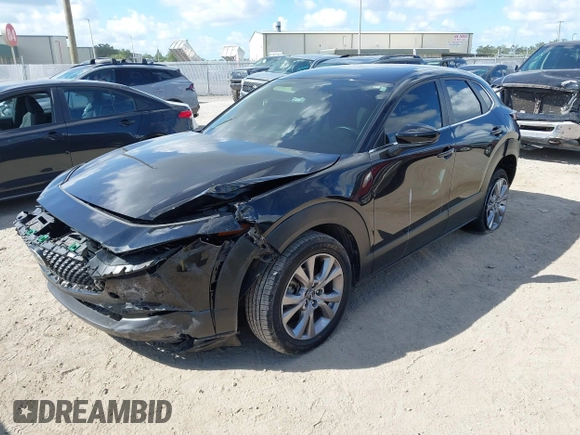 2021 Mazda CX-30 Select z VIN 3MVDMABL1MM251761, wystawiony jako IAAI lot #42267217 z przebiegiem 42 617 mil mil oraz . Historia ofert i sprzedaży dostępna na DreamBid. Obrazek 16.
