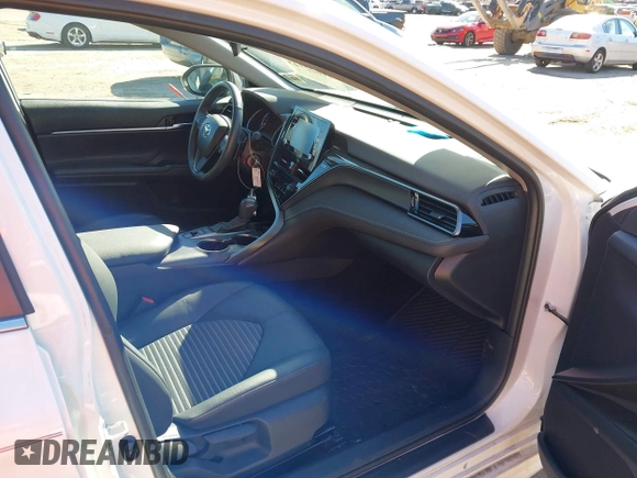 2023 Toyota Camry SE z VIN 4T1G11BK2PU076186, wystawiony jako IAAI lot #41602143 z przebiegiem 18 307 mil mil oraz . Historia ofert i sprzedaży dostępna na DreamBid. Obrazek 5.