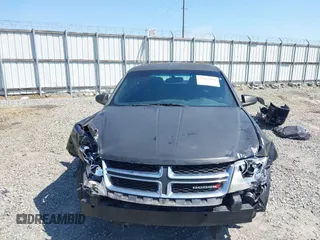 2014 Dodge Avenger SE with VIN 1C3CDZAB2EN170042, listed as a IAAI auction lot 41983094 with 168,760 mi miles and . Bid and sale history available at DreamBid. Image 13.
