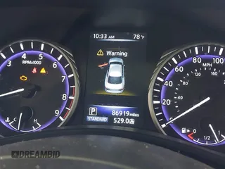 2015 Infiniti Q50 Premium z VIN JN1BV7AR9FM423471, wystawiony jako IAAI lot #42641857 z przebiegiem 86 919 mil mil oraz . Historia ofert i sprzedaży dostępna na DreamBid. Obrazek 7.