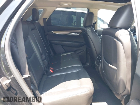 2018 Cadillac XT5 Premium Luxury AWD z VIN 1GYKNFRS3JZ112459, wystawiony jako IAAI lot #42590258 z przebiegiem 157 377 mil mil oraz . Historia ofert i sprzedaży dostępna na DreamBid. Obrazek 8.