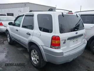 2007 Ford Escape XLT with VIN 1FMYU03197KB80133, listed as a IAAI auction lot 41084715 with 185,132 mi miles and . Bid and sale history available at DreamBid. Image 3.