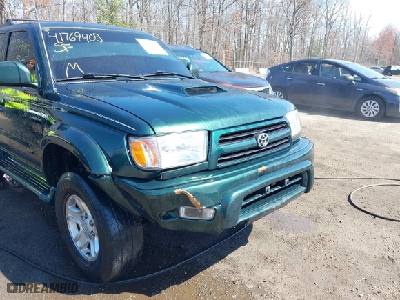 2000 Toyota 4Runner SR5 with VIN JT3HN86R1Y0323093, listed as a IAAI auction lot 41769405 with 156,905 mi miles. Bid and sale history available at carsss.com. Image 6.