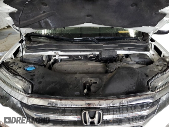 2018 Honda Pilot EX-L with VIN 5FNYF6H58JB040611, listed as a Copart auction lot 63614525 with 148,656 mi miles and Salvage title. Bid and sale history available at DreamBid. Image 12.