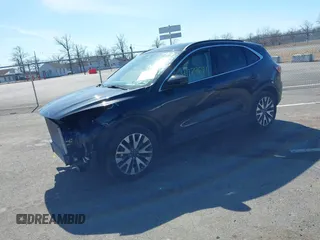 2020 Ford Escape Titanium z VIN 1FMCU9J98LUA44923, wystawiony jako IAAI lot #41779691 z przebiegiem 73 259 mil mil oraz . Historia ofert i sprzedaży dostępna na DreamBid. Obrazek 17.