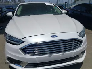 2020 Ford Fusion SE with VIN 3FA6P0LU9LR227928, listed as a IAAI auction lot 42445186 with 59,431 mi miles and . Bid and sale history available at DreamBid. Image 12.
