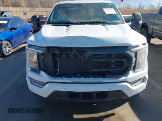 2023 Ford F-150 XL with VIN 1FTFW1E87PFB31057, listed as a IAAI auction lot 41388451 with 28,233 mi miles. Bid and sale history available at carsss.com. Image 12.