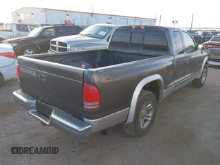 2002 Dodge Dakota SLT with VIN 1B7GL42X42S682184, listed as a IAAI auction lot 41784688 with 168,298 mi miles. Bid and sale history available at carsss.com. Image 4.
