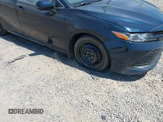 2019 Toyota Camry LE z VIN 4T1B11HK7KU269928, wystawiony jako IAAI lot #42048750 z przebiegiem 102 585 mil mil oraz . Historia ofert i sprzedaży dostępna na DreamBid. Obrazek 6.