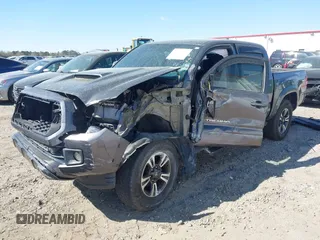 2017 Toyota Tacoma SR5 with VIN 5TFAZ5CN7HX033594, listed as a IAAI auction lot 41881117 with 86,676 mi miles and . Bid and sale history available at DreamBid. Image 17.