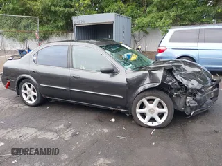 2000 Nissan Maxima GXE with VIN JN1CA31A3YT025913, listed as a IAAI auction lot 42635681 with 203,529 mi miles and . Bid and sale history available at DreamBid. Image 13.