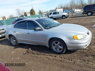2004 Pontiac Grand Am SE1 with VIN 1G2NF52E54M646874, listed as a IAAI auction lot 41564072 with 97,437 mi miles. Bid and sale history available at carsss.com. Image 13.