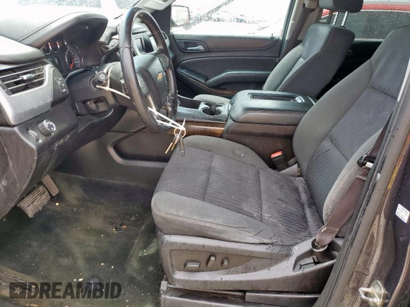 2015 Chevrolet Tahoe LS z VIN 1GNSCAKC4FR113247, wystawiony jako Copart lot #55578085 z przebiegiem 194 023 mil mil oraz Szkoda całkowita • Salvage title. Historia ofert i sprzedaży dostępna na DreamBid. Obrazek 7.