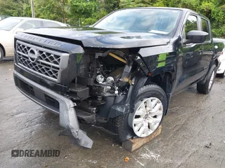 2023 Nissan Frontier SV with VIN 1N6ED1EK7PN609865, listed as a IAAI auction lot 42242070 with 56,462 mi miles and . Bid and sale history available at DreamBid. Image 6.