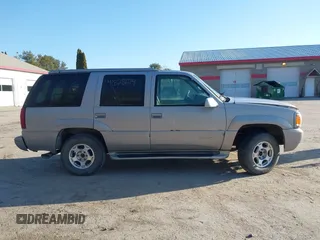 2000 GMC Denali with VIN 1GKEK13R7YR159609, listed as a IAAI auction lot 41828674 with 231,627 mi miles. Bid and sale history available at carsss.com. Image 14.