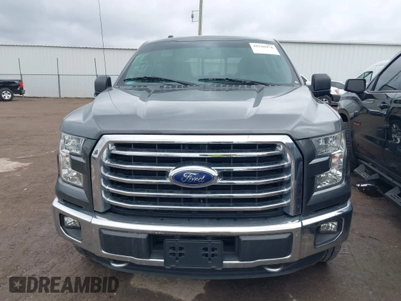 2015 Ford F-150 XLT with VIN 1FTEW1EG8FKE38679, listed as a IAAI auction lot 41526976 with 137,000 mi miles. Bid and sale history available at carsss.com. Image 13.