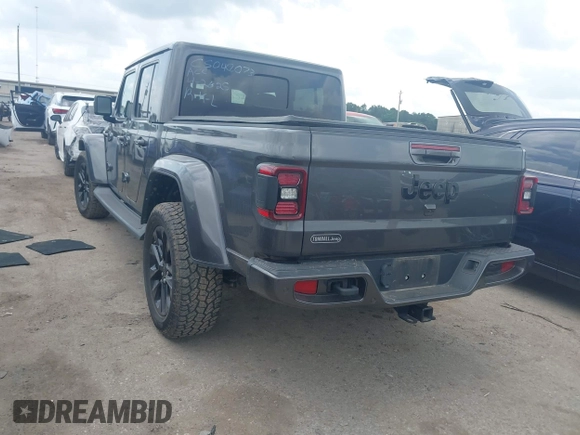 2021 Jeep Gladiator Overland with VIN 1C6HJTFG4ML617175, listed as a IAAI auction lot 42148031 with 70,627 mi miles and . Bid and sale history available at DreamBid. Image 3.
