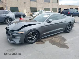 2020 Ford Mustang EcoBoost with VIN 1FA6P8TH6L5182192, listed as a IAAI auction lot 42129608 with 75,281 mi miles and . Bid and sale history available at DreamBid. Image 2.