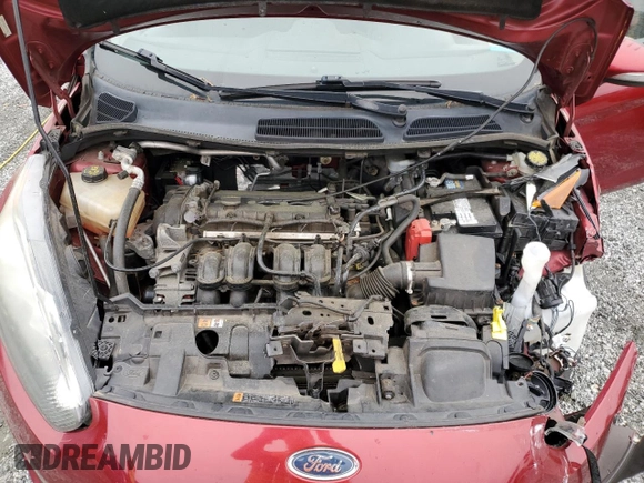 2015 Ford Fiesta SE z VIN 3FADP4BJ8FM171584, wystawiony jako Copart lot #51314105 z przebiegiem 129 643 mil mil oraz Szkoda całkowita • Salvage title. Historia ofert i sprzedaży dostępna na DreamBid. Obrazek 12.