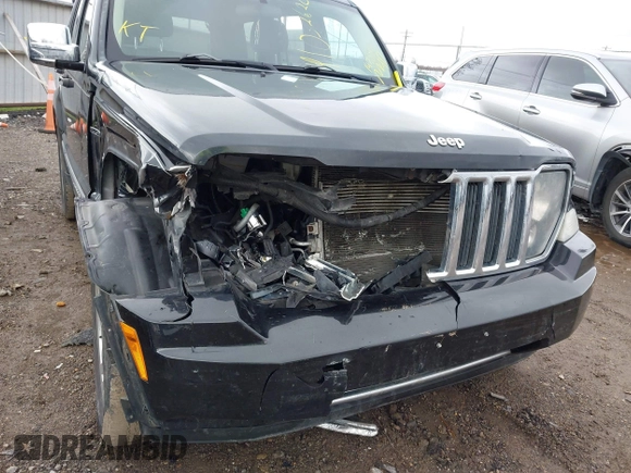 2011 Jeep Liberty Sport with VIN 1J4PN2GK2BW577724, listed as a IAAI auction lot 41032620 with 147,888 mi miles and . Bid and sale history available at carsss.com. Image 6.