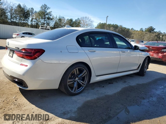 2018 BMW 7 Series 740i with VIN WBA7E2C59JG743247, listed as a Copart auction lot 88777325 with 69,071 mi miles and Salvage Title. Bid and sale history available at carsss.com. Image 3.
