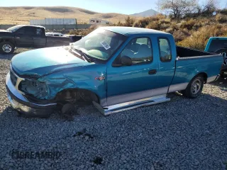 1997 Ford F-150 with VIN 1FTDX1725VKC16240, listed as a Copart auction lot 80091964 with 115,205 mi miles and Salvage title. Bid and sale history available at DreamBid. Image 1.