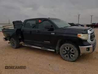 2014 Toyota Tundra 4WD Truck SR5 with VIN 5TFDW5F13EX398834, listed as a Copart auction lot 64028484 with 265,736 mi miles and Salvage Title. Bid and sale history available at carsss.com. Image 4.