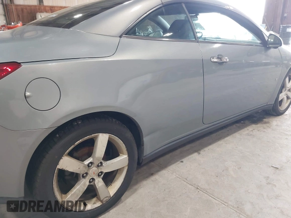 2007 Pontiac G6 GT z VIN 1G2ZH361X74127590, wystawiony jako IAAI lot #41828684 z przebiegiem 120 819 mil mil oraz . Historia ofert i sprzedaży dostępna na DreamBid. Obrazek 6.