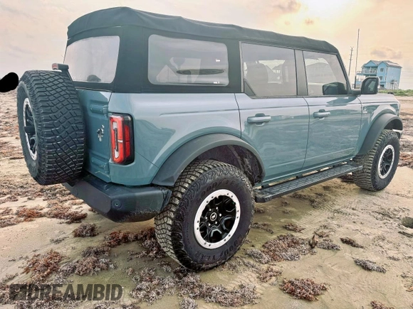 2022 Ford Bronco с VIN 1FMEE5DP3NLB62749, выставлен на аукционе Copart как лот 60267875 с пробегом 60 062 миль миль и Списание • Salvage title. История ставок и продаж доступна на DreamBid. Изображение 4.